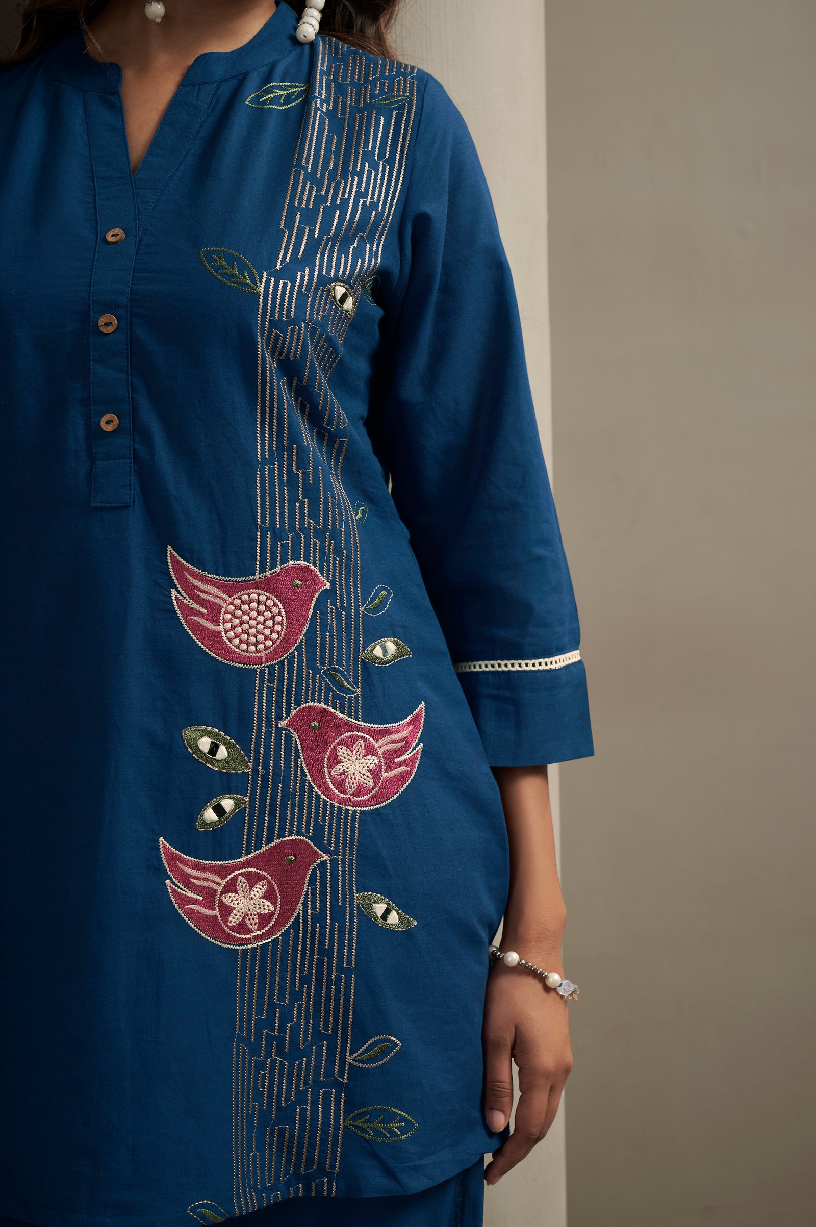 Women's Pure Cotton Bird Embroidered Straight Kurta with Solid Pure Cotton Pants