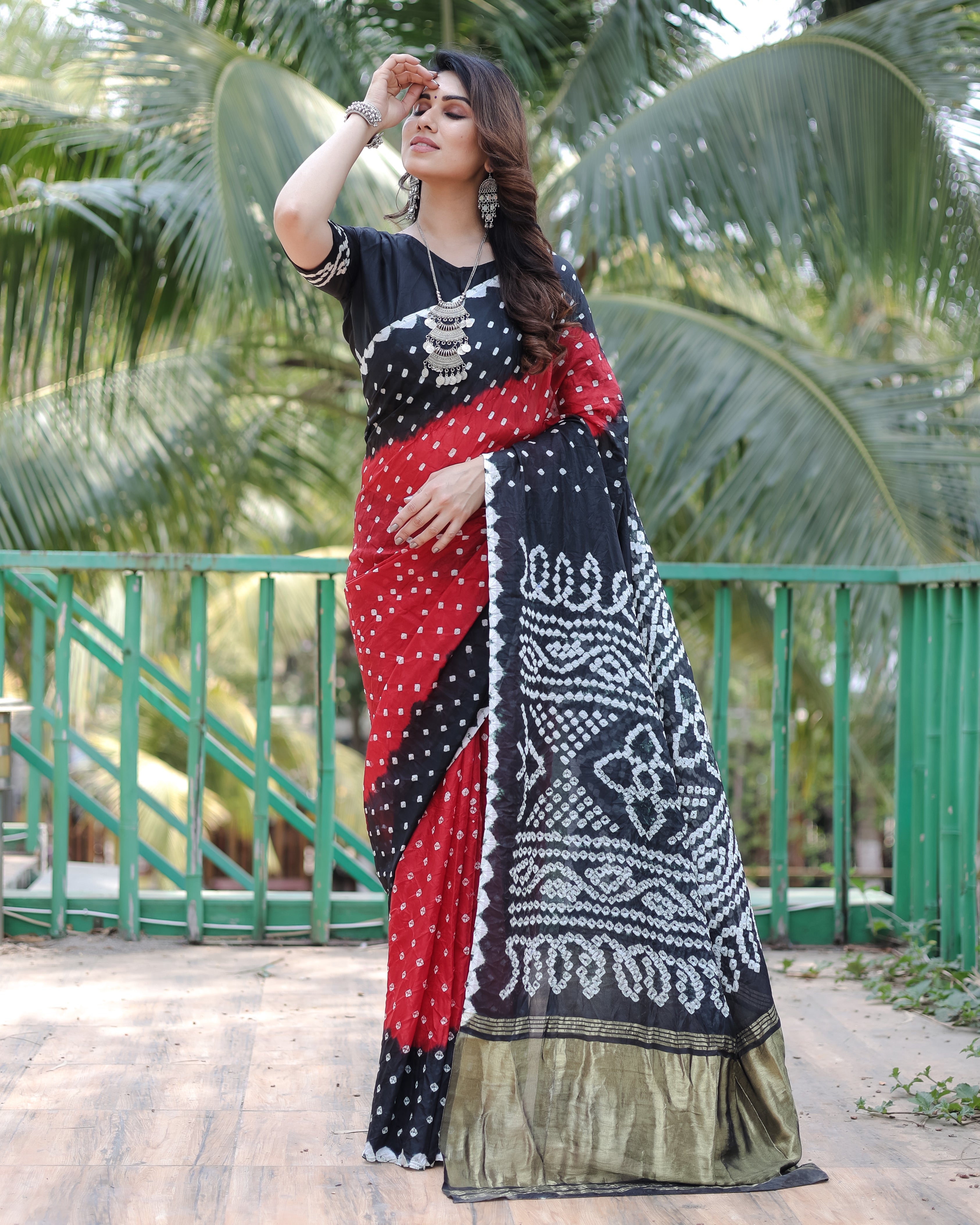 New Premium And High Quality Comfortable Bandhej Silk Drapes That is Super Stylish And Pretty Red And Black Saree