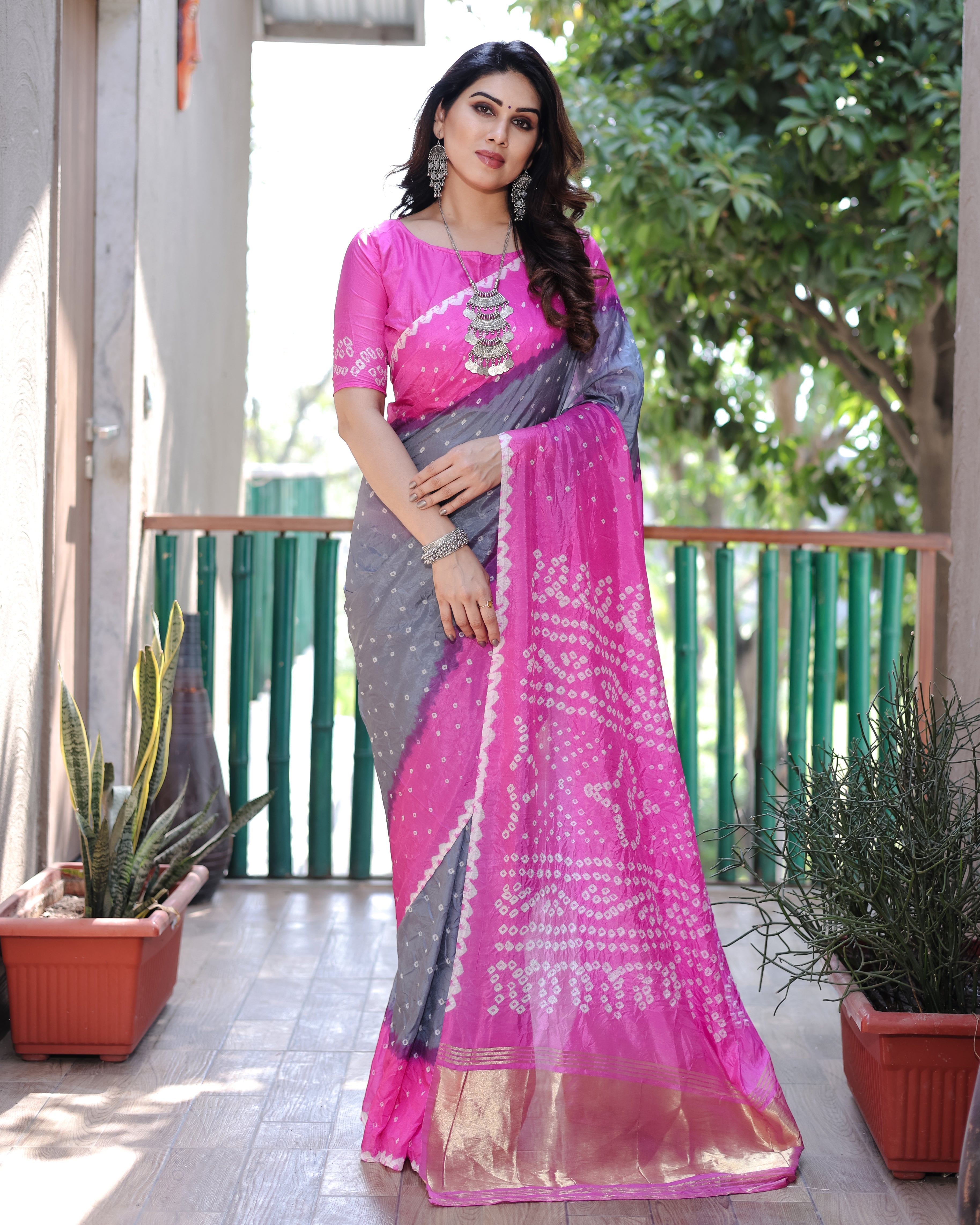 New Premium And High Quality Comfortable Bandhej Silk Drapes That is Super Stylish And Pretty Grey And Pink Saree